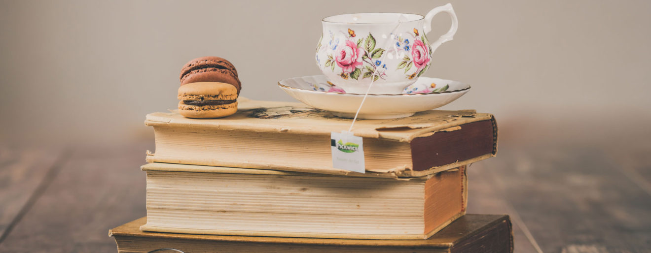 books and tea cup Photo by Ylanite Koppens from Pexels